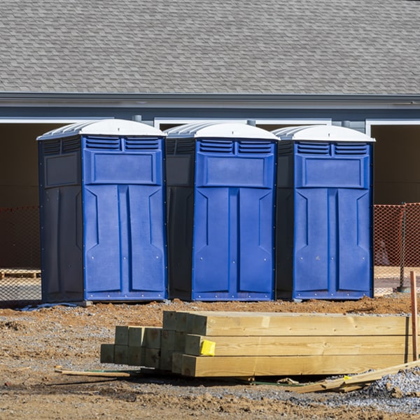 how often are the portable restrooms cleaned and serviced during a rental period in Hessel Michigan